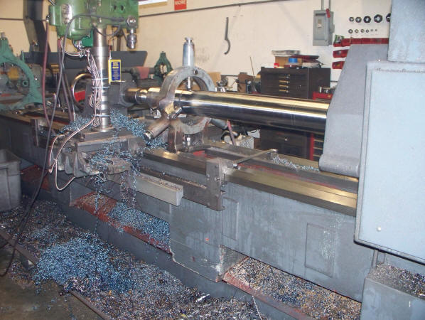 Got a big lathe and the glass scale is too short? Mount it to a moveable tram!